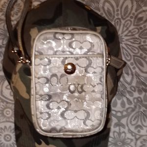 A small coach pouch, for cigarettes or to use as a change purse.